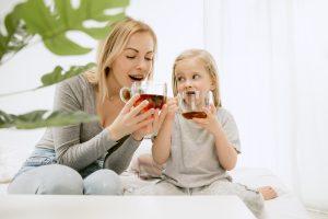 Kid drinking herbal tea